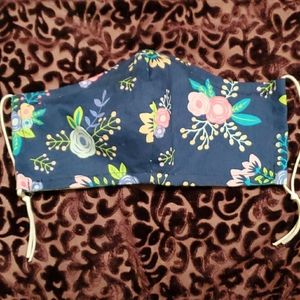 Floral face mask with adjustable straps and pocket